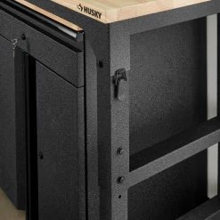 Husky 6 ft. Adjustable Height Solid Wood Top Workbench in Black with LINE-X Coating for Pro Duty Welded Steel Storage System -Tools Sales husky workbenches htc1000004 lx 1d 1000
